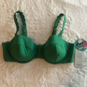 Bikini top originally from Target. Green with decorative straps.